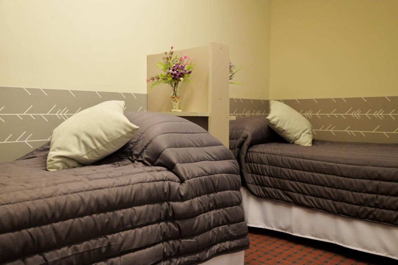 Cama Individual en habitación compartida femenina
